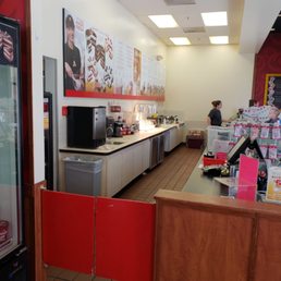 There are more employees here. They're all in the back talking on their cell phones. There are more employees here. They're all in the back talking on their cell phones.