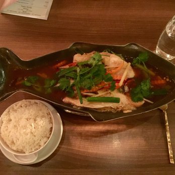 The Old Siam - Pla-nubg see ew: a great sea bass dish with ginger. Excellent! Served on a metal plate heated by tea candles. - Thai Near Me - York, YOR