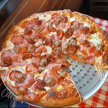 Gianni's Pizza - Meat lover's pizza: Italian sausage, Canadian bacon, linguica, pepperoni, mozzarella cheese, thick crust. - Italian Near Me - Monterey, California Gianni's Pizza - Meat lover's pizza: Italian sausage, Canadian bacon, linguica, pepperoni, mozzarella cheese, thick crust. - Italian Near Me - Monterey, California