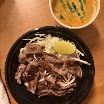 CoCoCurry - Panang curry with Marinated Strips of beef over rice - Thai Near Me - San Diego, California CoCoCurry - Panang curry with Marinated Strips of beef over rice - Thai Near Me - San Diego, California