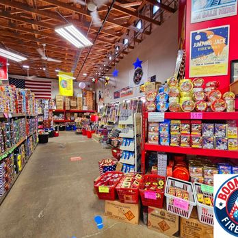 Boomtown Fireworks - Moving thru the entrance to 2 sections of firecrackers ranging from belts to bricks to16,000 rolls. - Fireworks Near Me - Dyer, Indiana