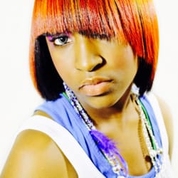 Celebrity Status Hair Studio - Triple threat! Silkwrap with a flower bomb color technique in the crown to give the illusion of a full head of color!