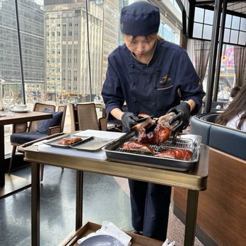 Mott 32 - Tableside duck slicing - Chinese Near Me - Toronto, Ontario