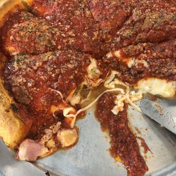 Chicago's Pizza - Yup a couple of slices of pizza is missing. This one was medium with 4 toppings - Pizza Near Me - San Antonio, Texas Chicago's Pizza - Yup a couple of slices of pizza is missing. This one was medium with 4 toppings - Pizza Near Me - San Antonio, Texas