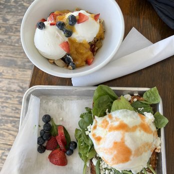 Mockingbird Cafe - Yogurt Parfait with house made granola & peach jam Avocado Toast with over easy egg - Cafes Near Me - Bay Saint Louis, Mississippi Mockingbird Cafe - Yogurt Parfait with house made granola & peach jam Avocado Toast with over easy egg - Cafes Near Me - Bay Saint Louis, Mississippi
