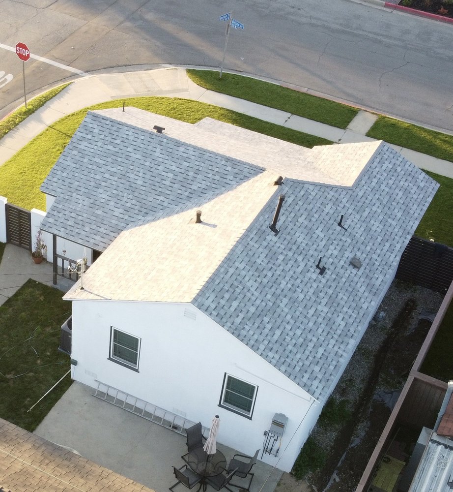 Slide of Home Town Roofing