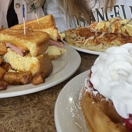 Almond strawberry waffle, Texas breakfast Sammy and make your own omelet