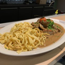 Sportrestaurant Im Neckarpark - Champiogne sp? German pork chops smothered in brown mushroom gravy with Noodles!!! Do yourself a favor...