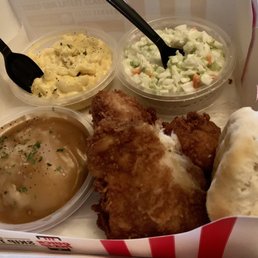 Two piece white meat meal with Mashed Potatoes & Gravy, Mac & Cheese, and Cole Slaw. Biscuit on the side.