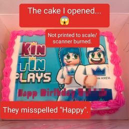 Poorly printed/misspelled cake - A decorated birthday cake features a printed image of cartoon characters and pink frosting along the edges, with overlay messages about the cake's printing and spelling errors.