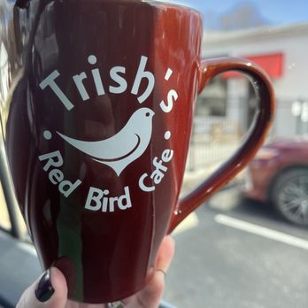 Trish's Red Bird Cafe - a person holding a coffee cup - Breakfast & Brunch Near Me - Dayton, Indiana Trish's Red Bird Cafe - a person holding a coffee cup - Breakfast & Brunch Near Me - Dayton, Indiana