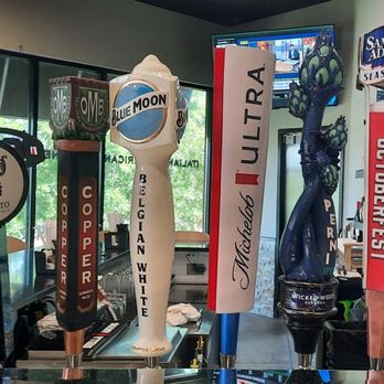Mi Amiche - a row of beer taps in a bar - Italian Near Me - Mooresville, North Carolina Mi Amiche - a row of beer taps in a bar - Italian Near Me - Mooresville, North Carolina