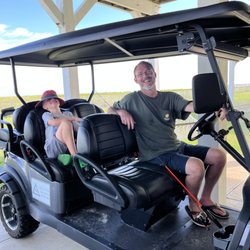 K6 Island Sports - Son-in-law and grandson headed out to fish in a pond. Golf cart paths everywhere at Pointe West Resport.