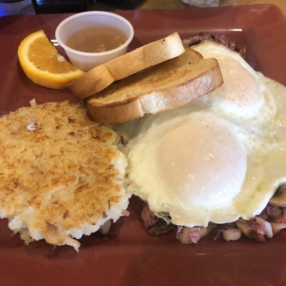 Toasted Mango Cafe - Corned beef hash (homemade!) with potato cakes and toast - Cafes Near Me - Sarasota, Florida Toasted Mango Cafe - Corned beef hash (homemade!) with potato cakes and toast - Cafes Near Me - Sarasota, Florida