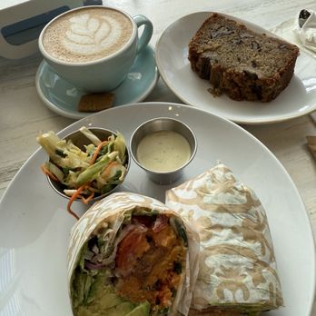Pura Vida Miami - CRUNCHY VEGGIE wrap, decaf oat latte, and vegan banana bread - Breakfast & Brunch Near Me - Miami, Florida Pura Vida Miami - CRUNCHY VEGGIE wrap, decaf oat latte, and vegan banana bread - Breakfast & Brunch Near Me - Miami, Florida