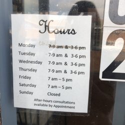 Angela's Bakery - Hours posted on door