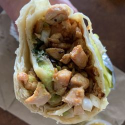 Pollo packed in the warm tortilla blanket with pico and guac. Yummy!