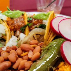 Tacos Tapatio - Wedding catering by Tacos Tapatio! The food was delicious! Rice and beans were great. Carne asada was better than the chicken.