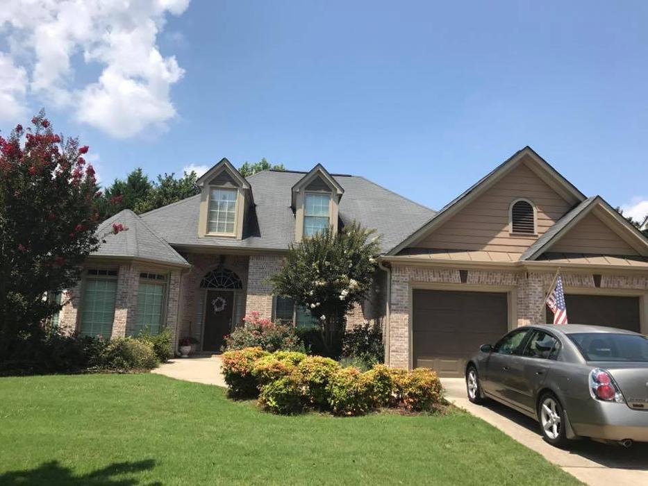 Slide of Champion Roofing