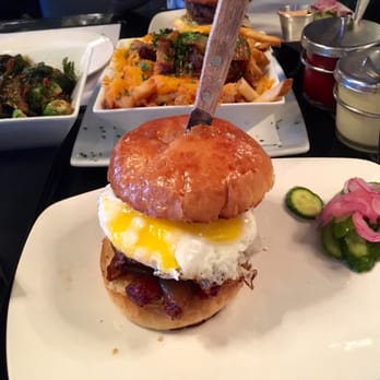 Morrison - Late breakfast burger. Fried Brussels & cheese fries with bacon jam in the background - Gastropubs Near Me - Los Angeles, California Morrison - Late breakfast burger. Fried Brussels & cheese fries with bacon jam in the background - Gastropubs Near Me - Los Angeles, California