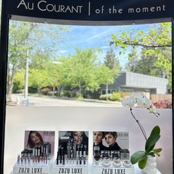 Au Courant Salon & The DEN