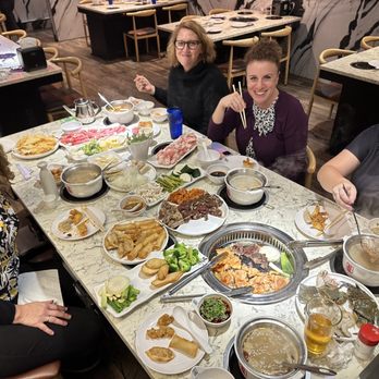 Master Ba's Hot Pot & BBQ - a group of women sitting at a table - Hot Pot Near Me - Sunrise, Florida Master Ba's Hot Pot & BBQ - a group of women sitting at a table - Hot Pot Near Me - Sunrise, Florida