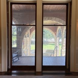 The floor to ceiling windows in the ballroom.