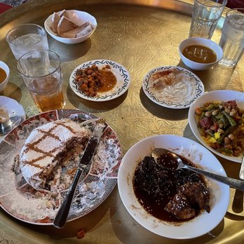 Casablanca Moroccan Restaurant - Chicken with plums tajine, veggie couscous, all the appetizers, and iced mint tea. - Moroccan Near Me - Sacramento, California Casablanca Moroccan Restaurant - Chicken with plums tajine, veggie couscous, all the appetizers, and iced mint tea. - Moroccan Near Me - Sacramento, California