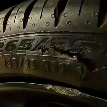 Tesla Service Center - Torn tire repaired with the utmost care. - Auto Repair Near Me - San Diego, California Tesla Service Center - Torn tire repaired with the utmost care. - Auto Repair Near Me - San Diego, California