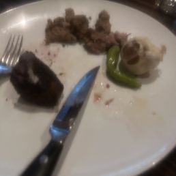 Steak on bottom, spit out remnants on top. Steak on bottom, spit out remnants on top.