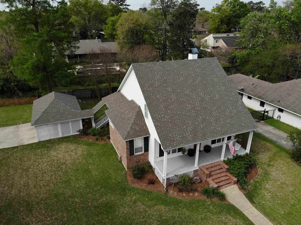 Slide of Mid City Roofing