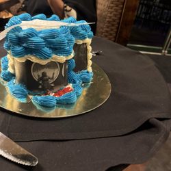 What Kind Cupcakery - Edible pictures all around the cake.