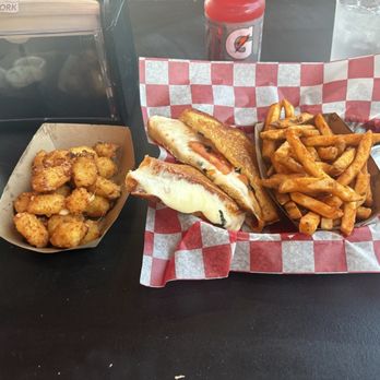 Cheesie's Pub & Grub - Cheese curds with ranch on the left, Caprese grilled cheese on the right - Pubs Near Me - Crestwood, Illinois Cheesie's Pub & Grub - Cheese curds with ranch on the left, Caprese grilled cheese on the right - Pubs Near Me - Crestwood, Illinois