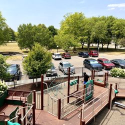 Humiston Riverside Park - Parking lot next to playground and splash pad.