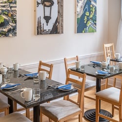 The Henry Guest House - Half the seating arrangement for breakfast 8AM weekdays 8:30AM weekends.