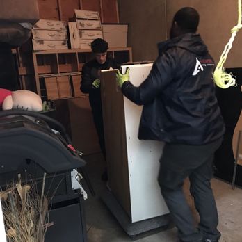 Accurate Moving Company - Lifting - Movers Near Me