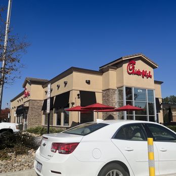 Chick-fil-A - ows a white car parked in front of a restaurant - Fast Food Near Me - Knightdale, North Carolina
