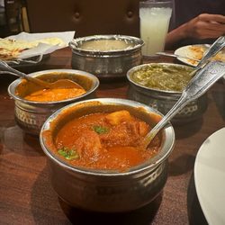Tandoori Oven - Center: lamb vindaloo, Left: Chicken Tikka Masala, Right: Saag Paneer