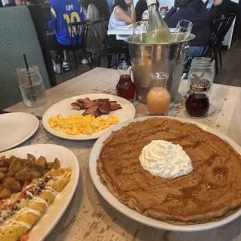 Toast Kitchen & Bar - Pumpkin Spice Pancake Combo with Side of Shoulder Ham Hickory Smoked and scrambled eggs. Chorizo Omelette with Country Potatoes. - Breakfast & Brunch Near Me - Brea, California Toast Kitchen & Bar - Pumpkin Spice Pancake Combo with Side of Shoulder Ham Hickory Smoked and scrambled eggs. Chorizo Omelette with Country Potatoes. - Breakfast & Brunch Near Me - Brea, California