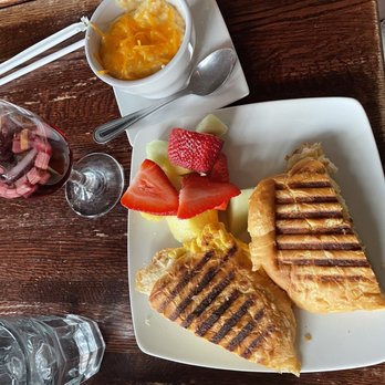 Teavolve - Breakfast panini with a side of grits - Coffee & Tea Near Me - Baltimore, Maryland