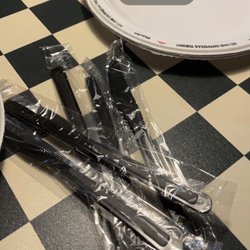 Pizza Hut - The plastic knives and paper plates we were giving ..