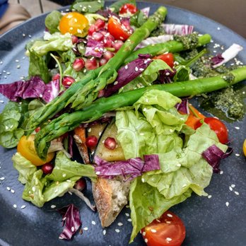 Salü - Open-faced eggplant sandwich with roasted red pepper sauce and sesame pesto (bread and eggplant are underneath all those beautiful veggies) - Salad Near Me - Jena, TH