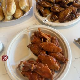 Sweet chili and hot wings with 2 sides of veggies and the bread melts in your mouth amazing! Sweet chili and hot wings with 2 sides of veggies and the bread melts in your mouth amazing!