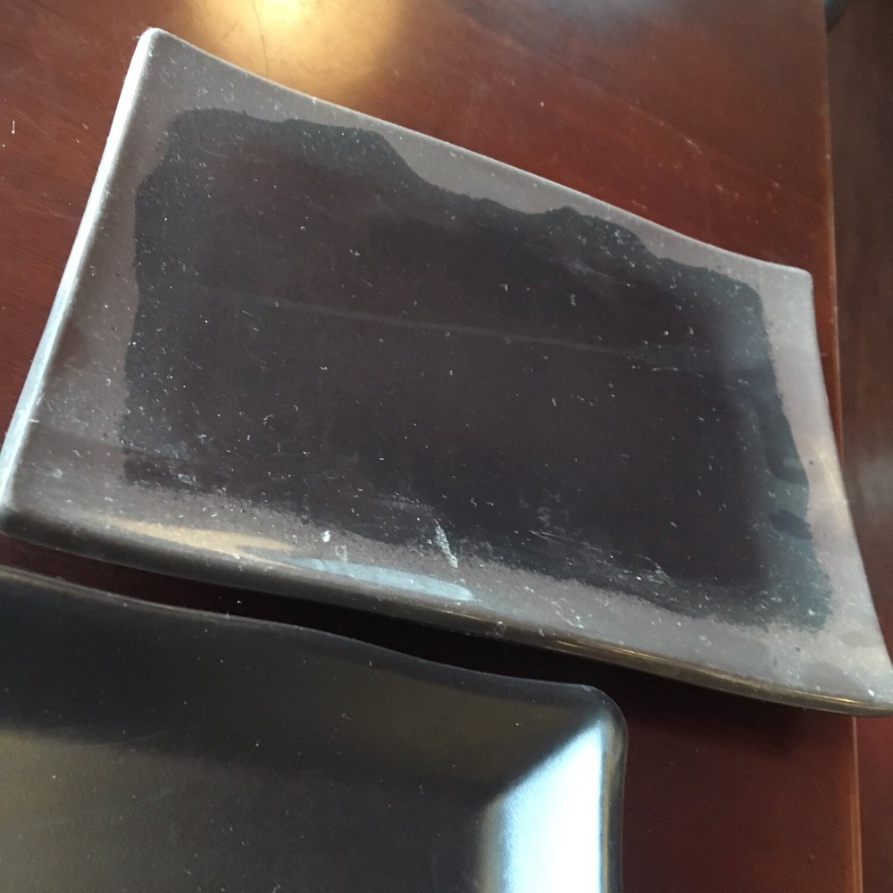 Geisha - This plate was brought to me to eat off of. Crusted food & dust. Waiter didn't care. - Japanese Near Me - Capitola, California