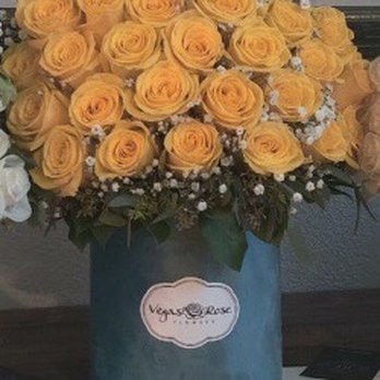 Vegas Rose Flowers - Blue vase with yellow roses. This one is the standard size with 24 roses. - Florists Near Me - Las Vegas, Nevada Vegas Rose Flowers - Blue vase with yellow roses. This one is the standard size with 24 roses. - Florists Near Me - Las Vegas, Nevada
