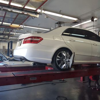 Performance Automotive & Tire Center - My car on the lift getting an alignment done. - Auto Repair Near Me - Mesa, Arizona