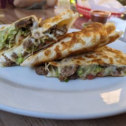 two quesadillas on a plate two quesadillas on a plate