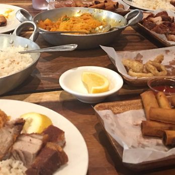 Isla Restaurant - Lumpia Shanghai, garlic fried rice, pancit palabok, lechon kawali, and calamari rings.. - Filipino Near Me - San Bruno, California
