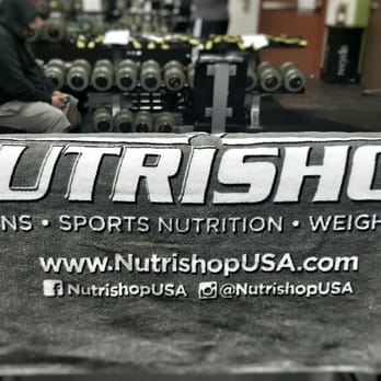 Nutrishop - a man working out in a gym - Vitamins & Supplements Near Me - Beaumont, California Nutrishop - a man working out in a gym - Vitamins & Supplements Near Me - Beaumont, California