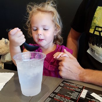 Red Flame - Adiline practicing her soup spoon skills. - Hot Pot Near Me - Westminster, California Red Flame - Adiline practicing her soup spoon skills. - Hot Pot Near Me - Westminster, California